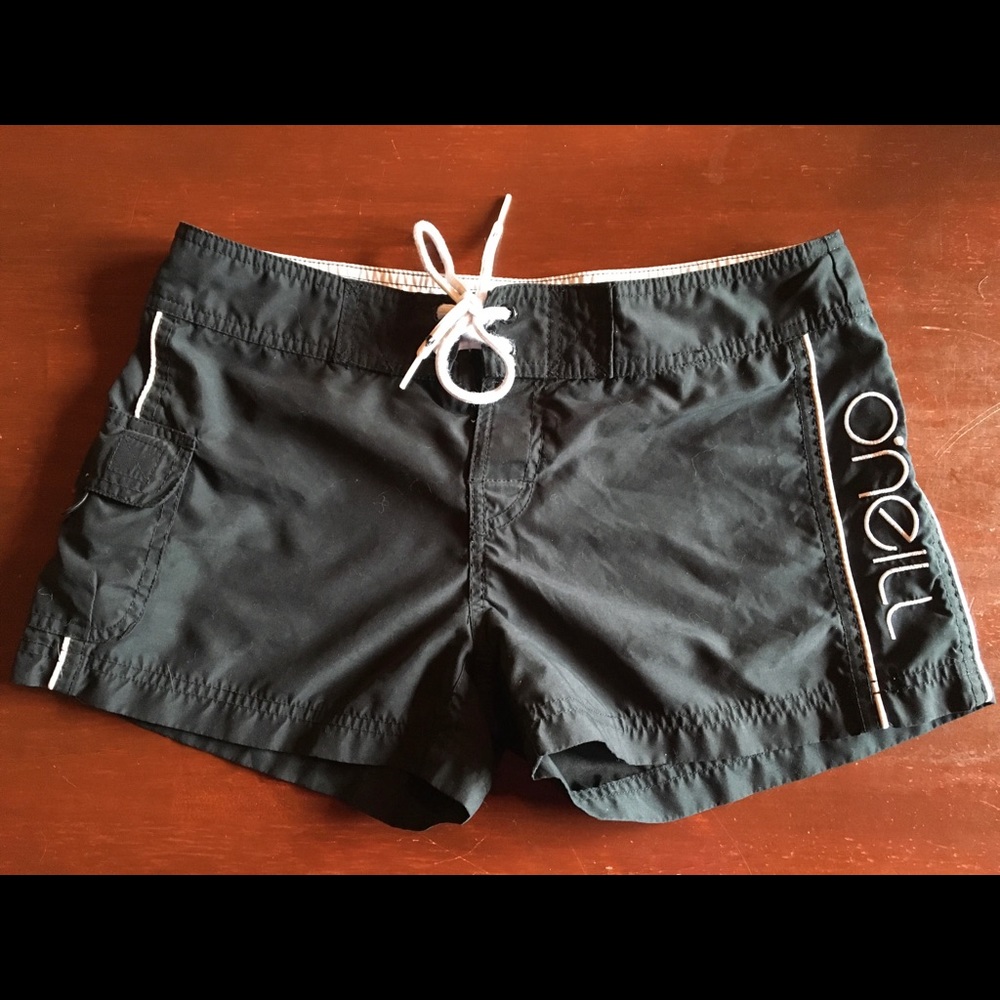 O’Neill board shorts black size 5 excellent condition. Surf